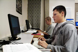 ALS students work on keyboarding classwork