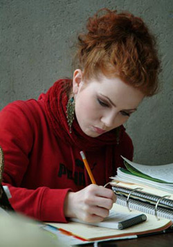ALS student doing classwork