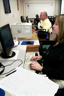 ALS students working on computer classwork