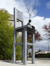 Photo of boy in chair sculpture