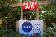 Photo KLCC booth at Oregon Country Fair