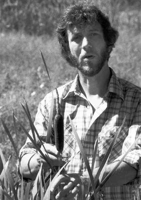 Jay Marston with cattails, photo