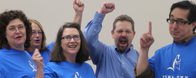 IT staff, faculty cheering