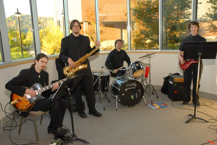 band playing in large alcove of Center lobby