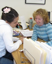 photo of faculty member working with a student