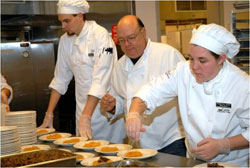 Culinary students learning about plating