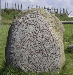 Photo of stone with Celtic design carved in it.