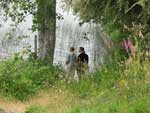 photo of two visitors near lake during Siltcoos Station open house