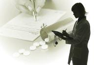 nurse recording information in patient chart