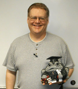 Phil Powers and his award