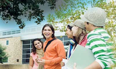 students outside building