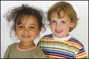 Boy and girl standing next to each other