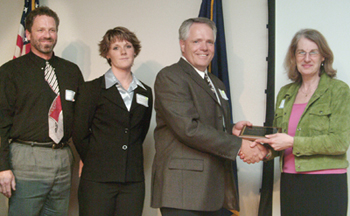 picture of Mark Bolander, Jackie Farrar, Jerry Tippets of King Retail Solutions and Mary Spilde