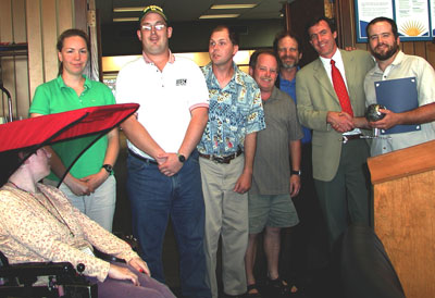 picture of Lane recycling staff accepting award 