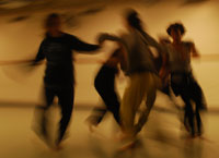 image of improv dancers in motion