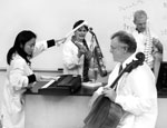 picture of four music faculty in lab