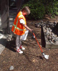 Student Worker picking up trash