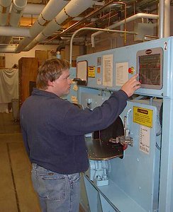 Student Worker setting washing machine