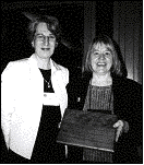 Lane’s President Mary Spilde and Kate Barry, Women’s Program Director,  receiving the 2001 Model Program Award